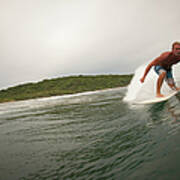 A Male Surfer In A Barrel Of A Wave In Poster