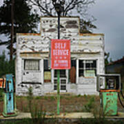 Abandoned Petrol Station At Dusk Poster