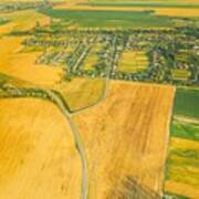 Aerial View Of Village And Hay Rolls Poster
