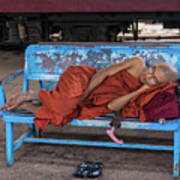 Burmese Monk Resting On Bench Poster