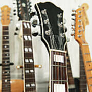 Close Up Of Various Guitars Poster