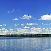 Cumulus Clouds Over Lake Poster