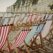 Deck Chairs On Empty Beach Poster