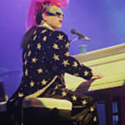 Elton John Performs With Mohawk Hairdo Poster