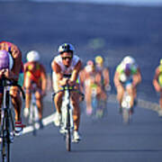 Iron Man Triathlon Cyclists Defocussed Poster