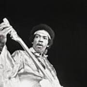 Jimi Hendrix Tuning Guitar On Stage Poster
