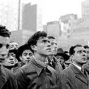 People In Times Square Listen To A Poster