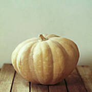 Pumpkin On Wooden Table Poster