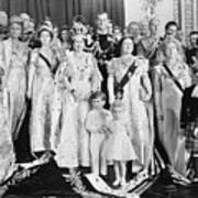 Queen Elizabeth Poses With Royal Family Poster