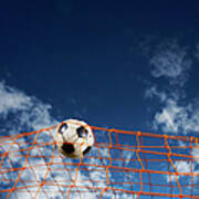 Soccer Ball Going Into Goal Net Poster