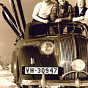 Three Fashion Models With 1940s Vehicle And Skis Poster