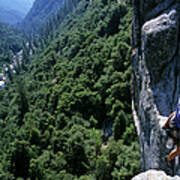 Woman Rock Climbing High Above River Poster