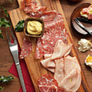 Wooden Platter With Sliced Deli Meats Poster