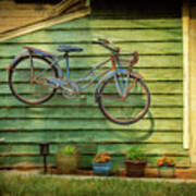 Blue Bicycle On The Wall Poster