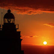 Cape Prior Silhouetted Lighthouse Against Orange Sky Sunset And Sun At The Horizon Ferrol La Corua Galicia Poster