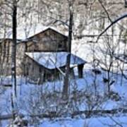 An Old Brown Barn In Snow Poster