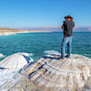 Photographer At The Dead Sea Poster