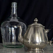 Silver Teapot And Demijohn Black Background Marble Table Poster