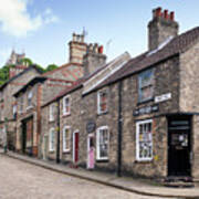 Traditional Cottages Along Steep Hill In Lincoln Poster