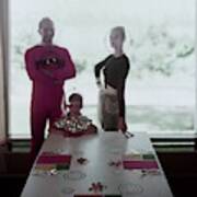 A Family Posing By A Dining Table Art Print