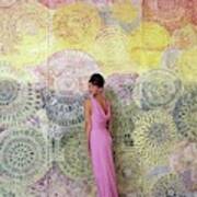 A Model Posing By A Colorful Mural Art Print