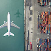 Airplane Flying Over Container Port Art Print
