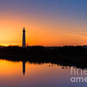 As The Sun Sets And The Water Reflects Art Print