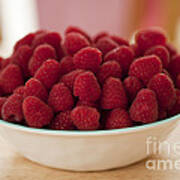 Bowl Of Raspberries On Table Art Print