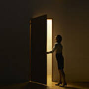 Business Woman Opening  Door Standing In Light Art Print