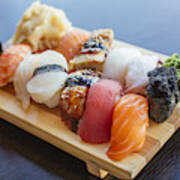Close-up Of Sushi Set On Wooden Board Art Print