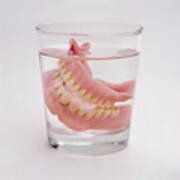 False Teeth In Glass Of Water, Close-up Art Print