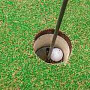 Golf Ball On A Green In Front Of The Hole Art Print