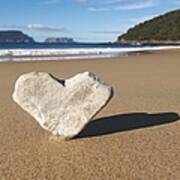 Heart Shaped Rock Sitting In Sand At Art Print