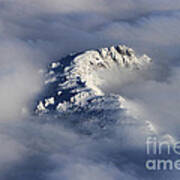 High Mountain Snow Caps Peaking Through The Clouds Art Print