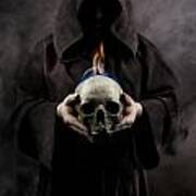 Man In The Hooded Cloak Holding Burning Human Skull In His Hand Art Print