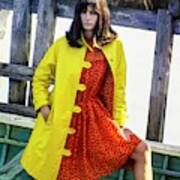 Model On A Boat In A Yellow Over Coat And A Red Art Print