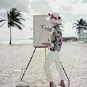 Model Standing On A Beach In Front Of An Easel Art Print