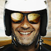 Photograph Of A Happy Male Biker Smiling With Sky Backdrop Art Print
