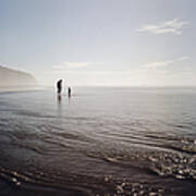 Silhouettes Of Father And Child At Beach Art Print