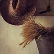 Straw hat hanging on coat hook Photograph by Sandra Cunningham - Pixels