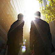 Two Businessmen Looking Up Into The Sun. Art Print