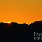 Vibrant Orange Sky Accompanies Sun Rising Over Grand Canyon With Distant Watchtower Silhouetted Art Print