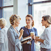 Women Talking During Coffee Break At Convention Center Art Print