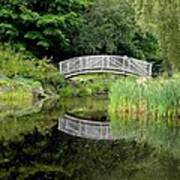 Wooden Bridge Over Quiet Pond Art Print