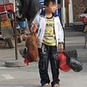 Young Boy Carrying A Dead Chicken To School Art Print