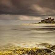 Bamburgh Castle Under A Cloudy Sky Art Print