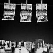 Three Twenty Pounds Sterling Banknotes Hanging On A Washing Line With Blue Sky Above A City Skyline Art Print