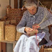 A Woman Weaving A Basket In Castelsardo Art Print
