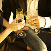 Couple Sitting, Clinking Champagne Art Print