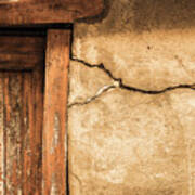 Cracked Lime Stone Wall And Detail Of An Old Wooden Door Art Print